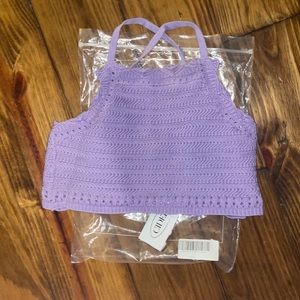 Pretty purple knit crop top. Never been worn & still has the tags on it.